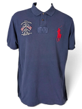 JAKE & IPI navy blue cotton polo shirt featuring a red Big Pony logo and USA flag embroidery on the chest.