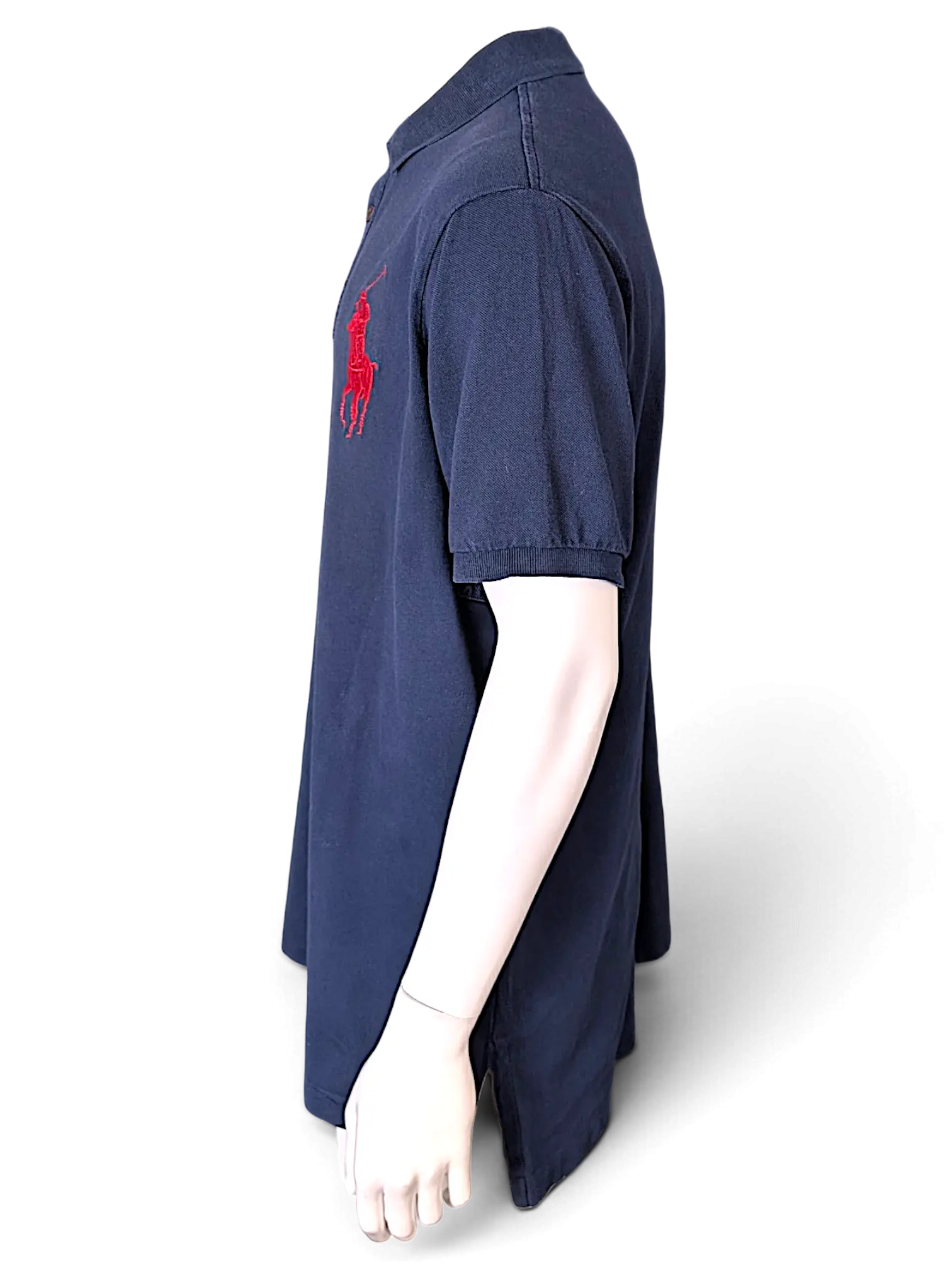 JAKE & IPI navy blue cotton polo shirt with a large red embroidered pony logo on the chest, side view