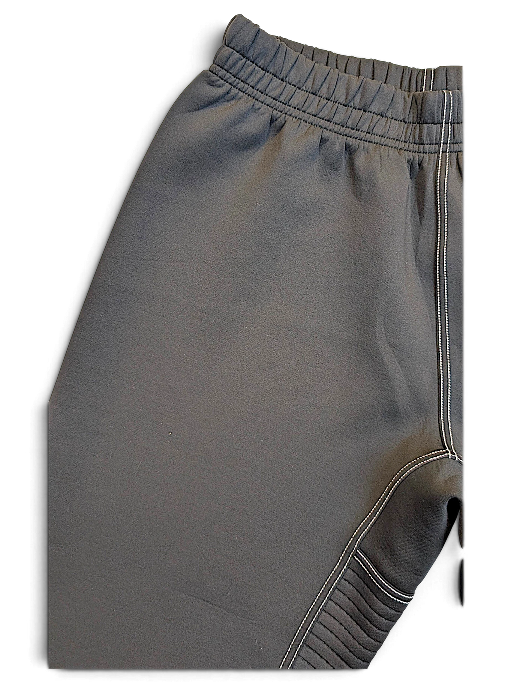 JAKE & IPI Nike Dri-FIT black performance track pants with elastic waistband and white contrast stitching detail.