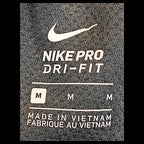 JAKE & IPI Nike Pro Dri-FIT black track pants size M label detail with Swoosh logo