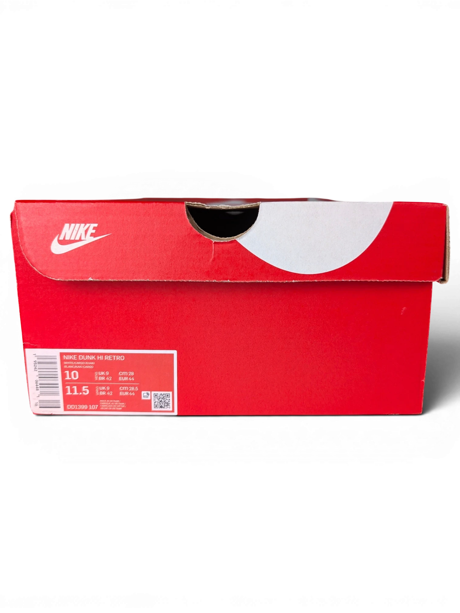 JAKE & IPI Nike Dunk High Cargo Khaki sneaker box with white and green branding on a red cardboard background