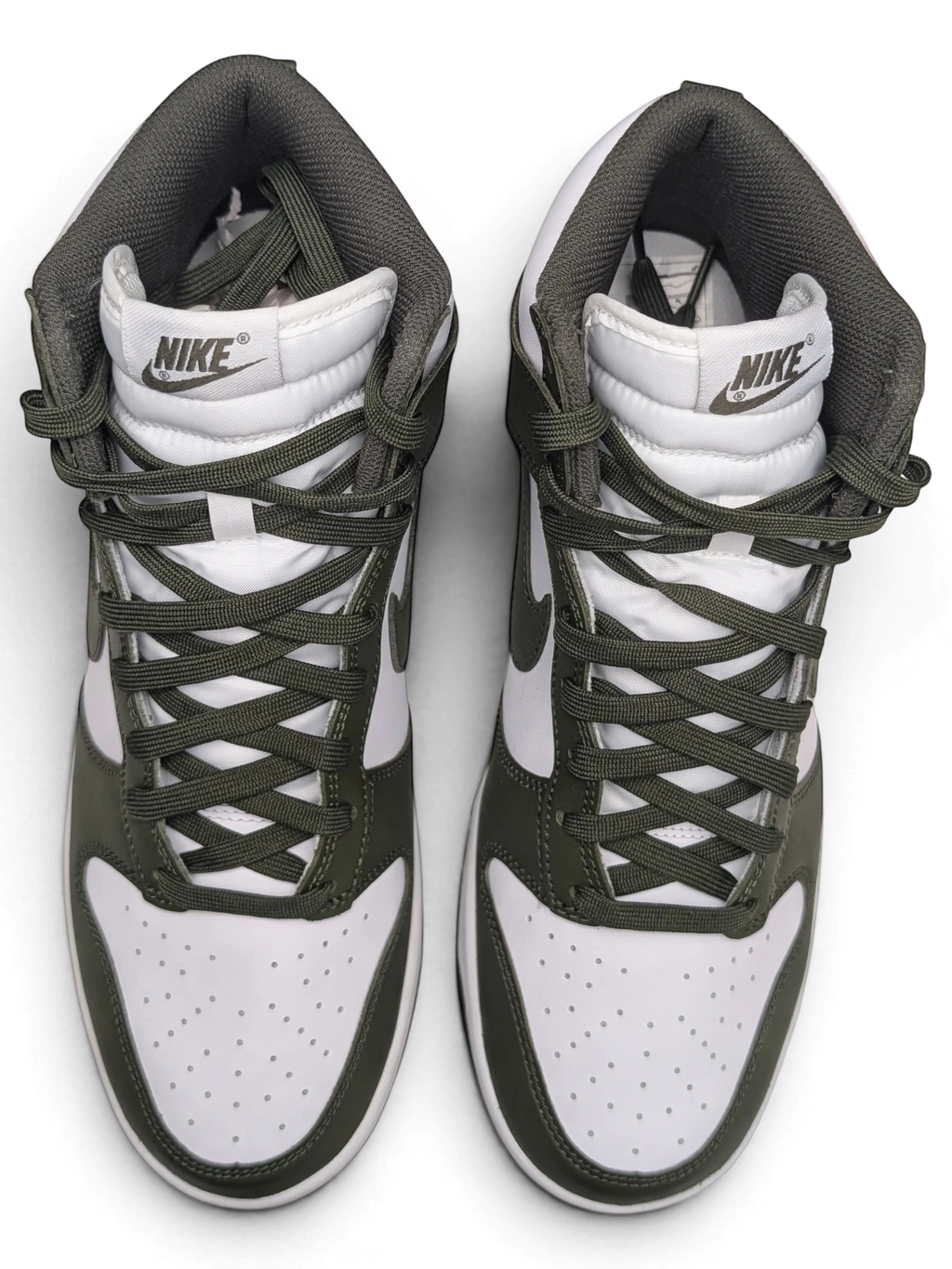 JAKE & IPI Nike Dunk High sneakers in white and Cargo Khaki leather with matching laces and high-top silhouette.