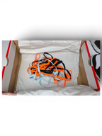 JAKE & IPI Nike Dunk High Cargo Khaki sneaker laces in orange, black, and light blue inside a shoe box.