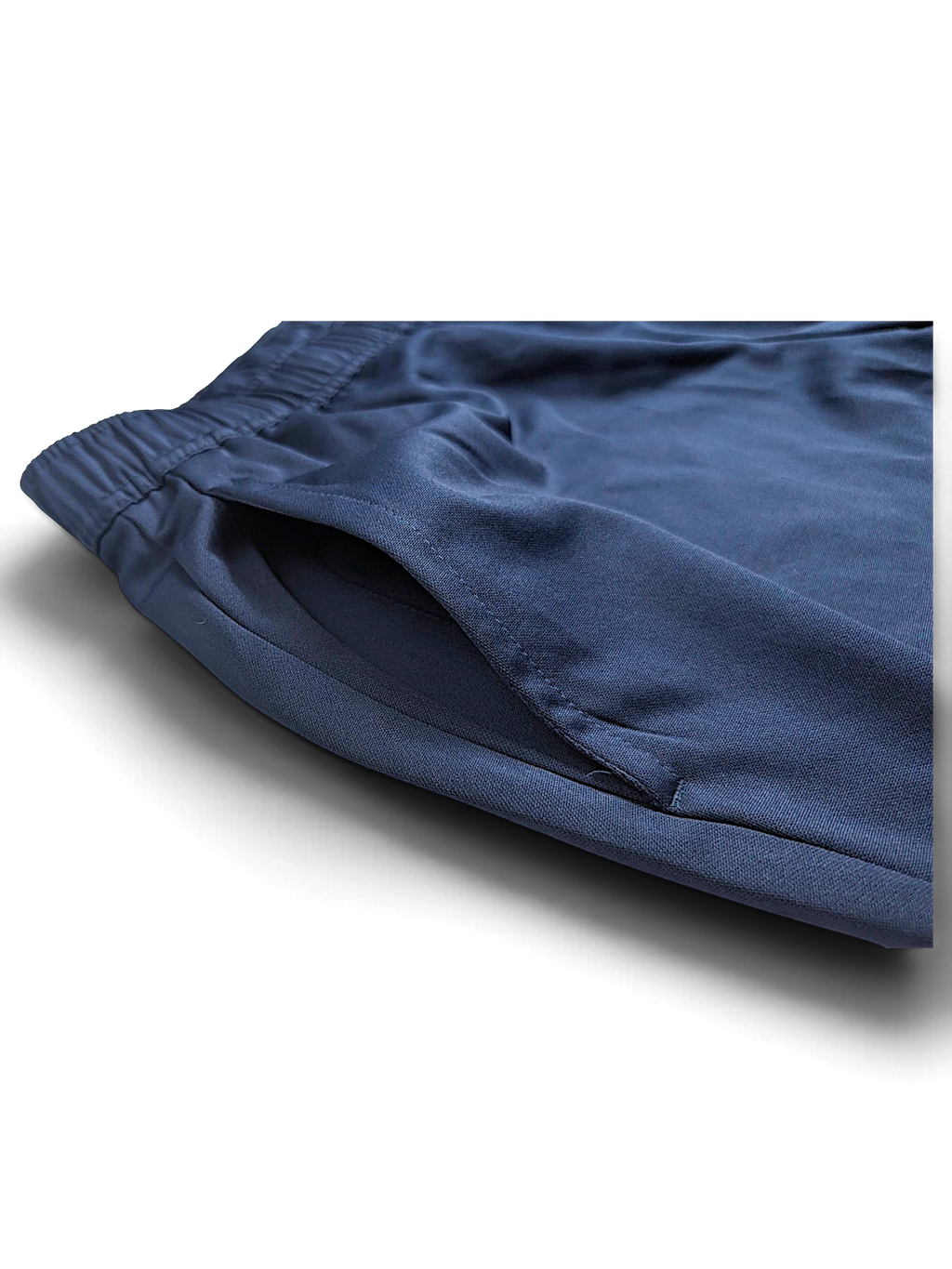 JAKE & IPI pre-owned Nike Dri-FIT navy blue track pants featuring a comfortable elastic waistband and side pocket