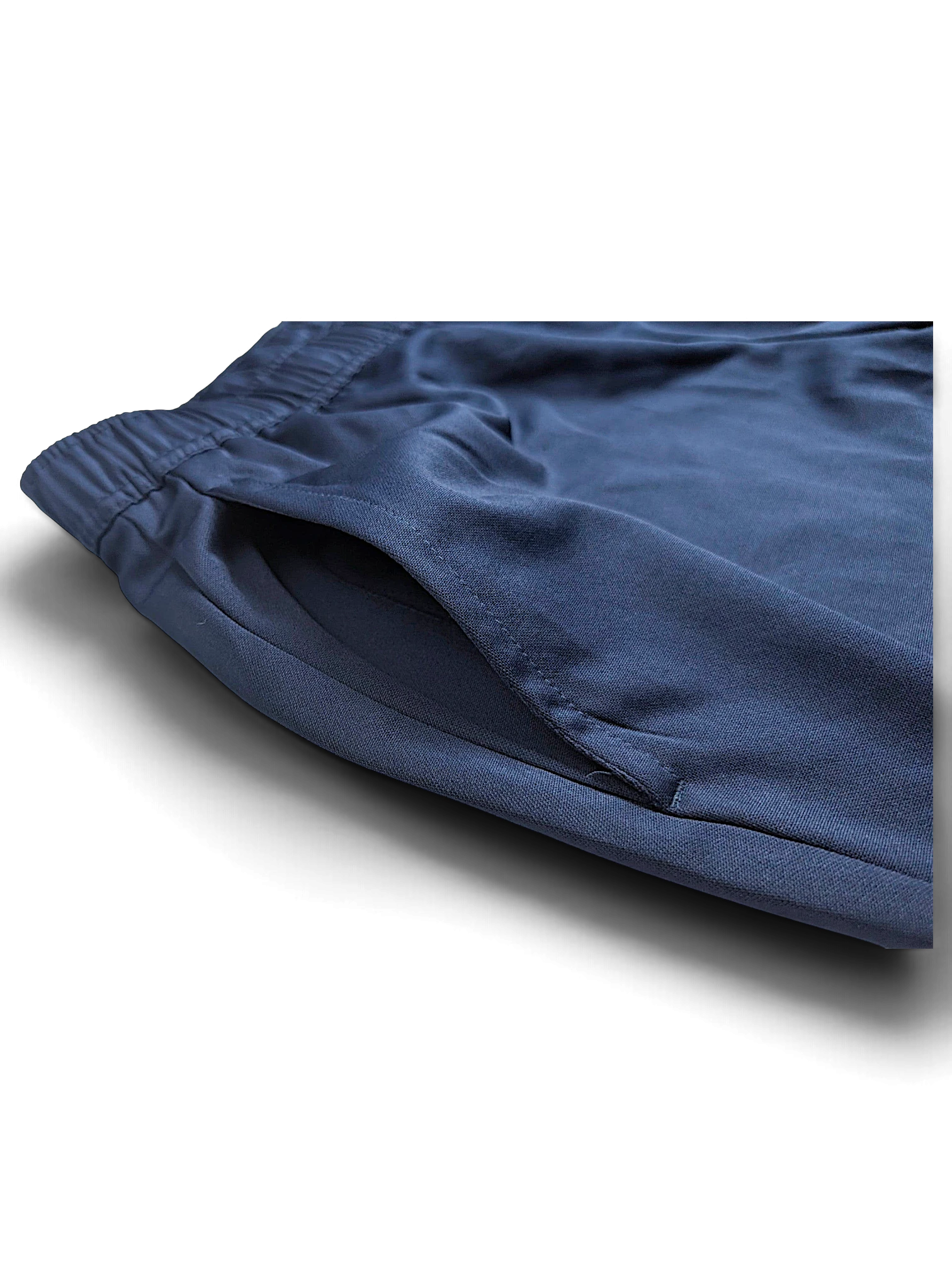 JAKE & IPI pre-owned Nike Dri-FIT navy blue track pants featuring a comfortable elastic waistband and side pocket