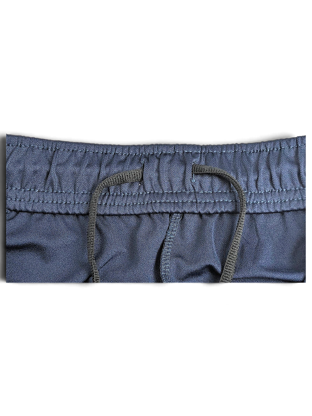 JAKE & IPI Nike Dri-FIT navy blue track pants featuring an elasticated waistband with an adjustable drawstring