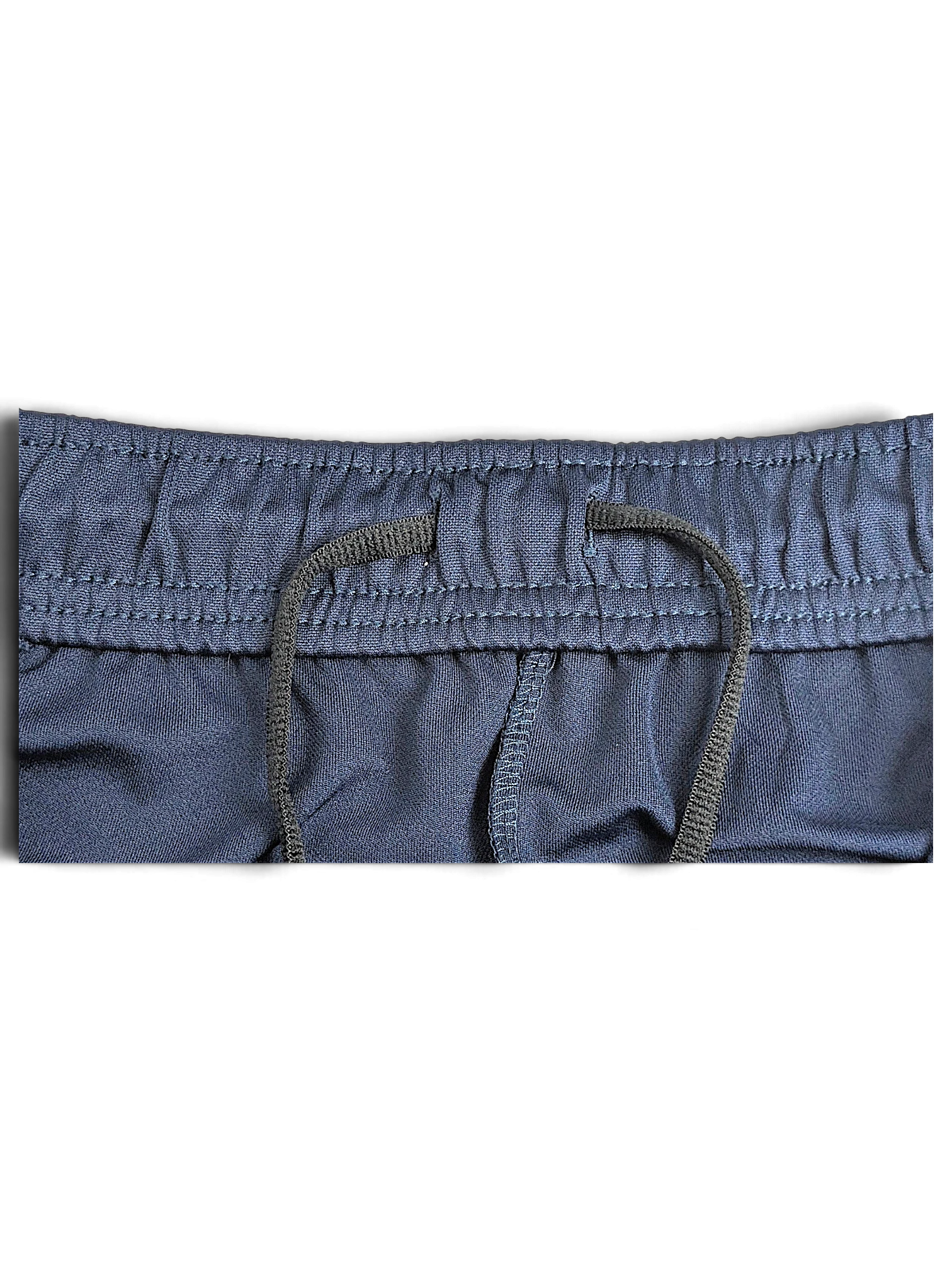 JAKE & IPI Nike Dri-FIT navy blue track pants featuring an elasticated waistband with an adjustable drawstring