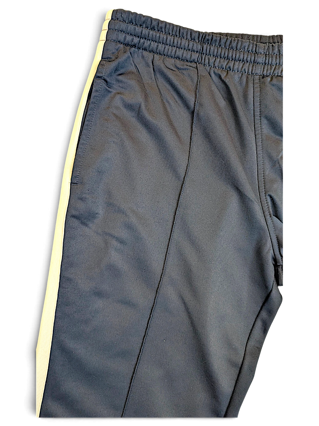 JAKE & IPI Nike navy track pants with a white side stripe and elasticated waistband