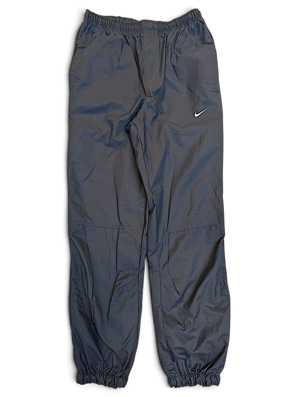 JAKE & IPI pre-owned navy Nike windbreaker track pants with a lightweight shell and white Swoosh logo