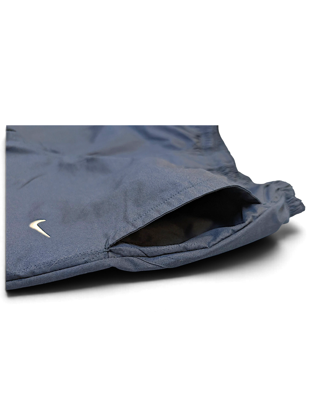 JAKE & IPI pre-owned navy Nike windbreaker track pants featuring a side pocket and embroidered Swoosh logo