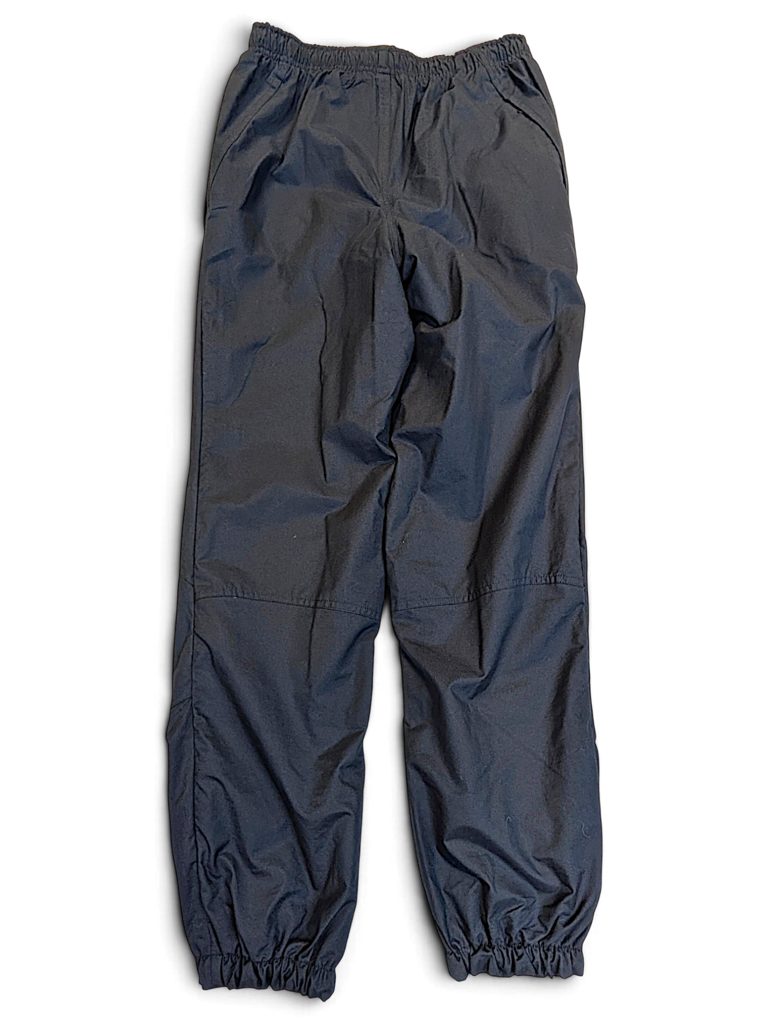 JAKE & IPI pre-owned Nike navy windbreaker track pants with a lightweight shell and elasticated cuffs.
