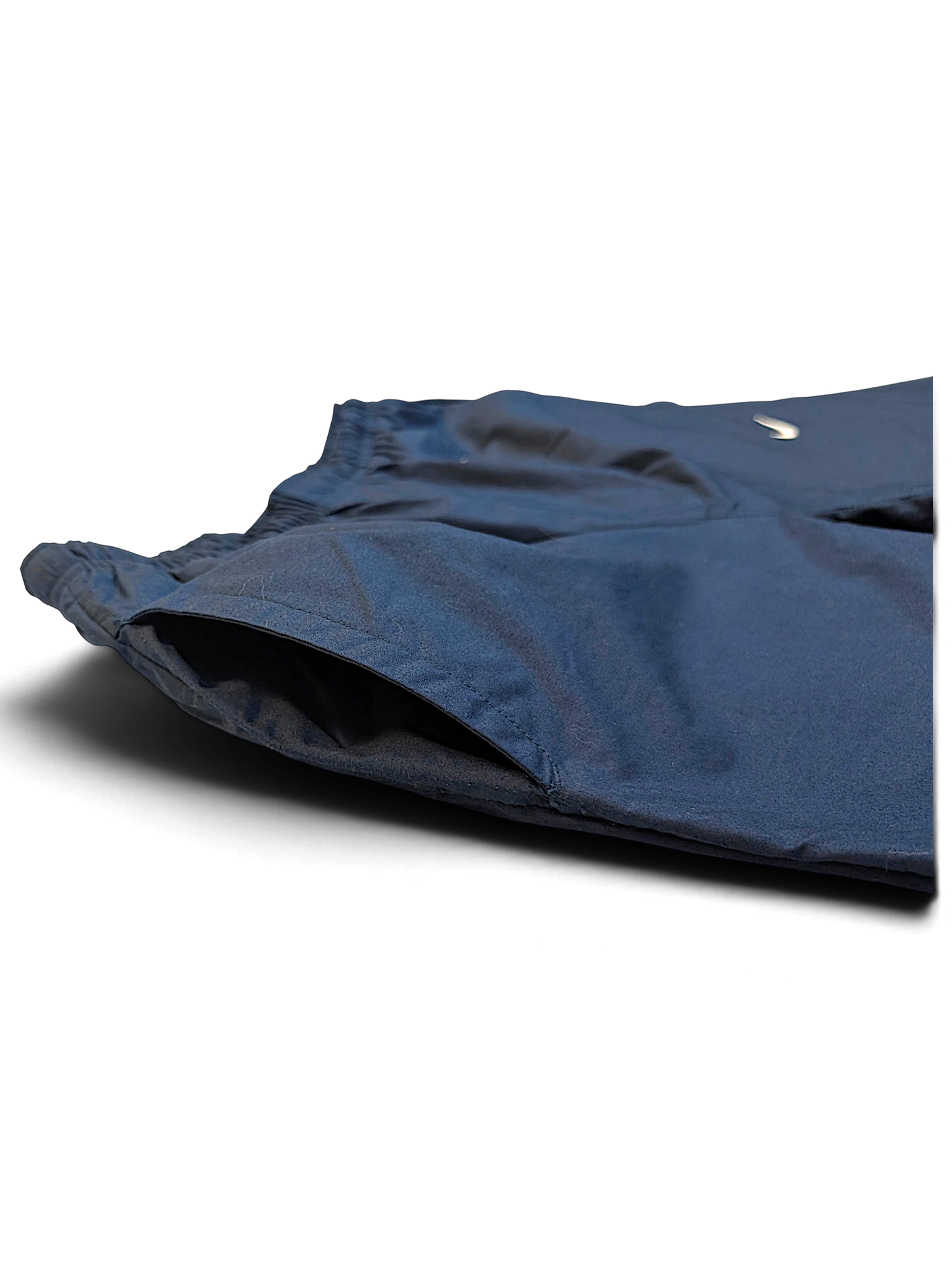 JAKE & IPI pre-owned navy Nike windbreaker track pants with side pocket and Swoosh logo detail