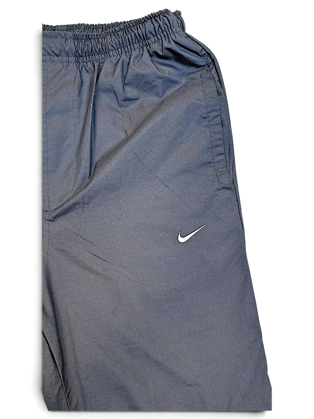JAKE & IPI pre-owned navy Nike windbreaker track pants with an elasticated waist and small white Swoosh logo