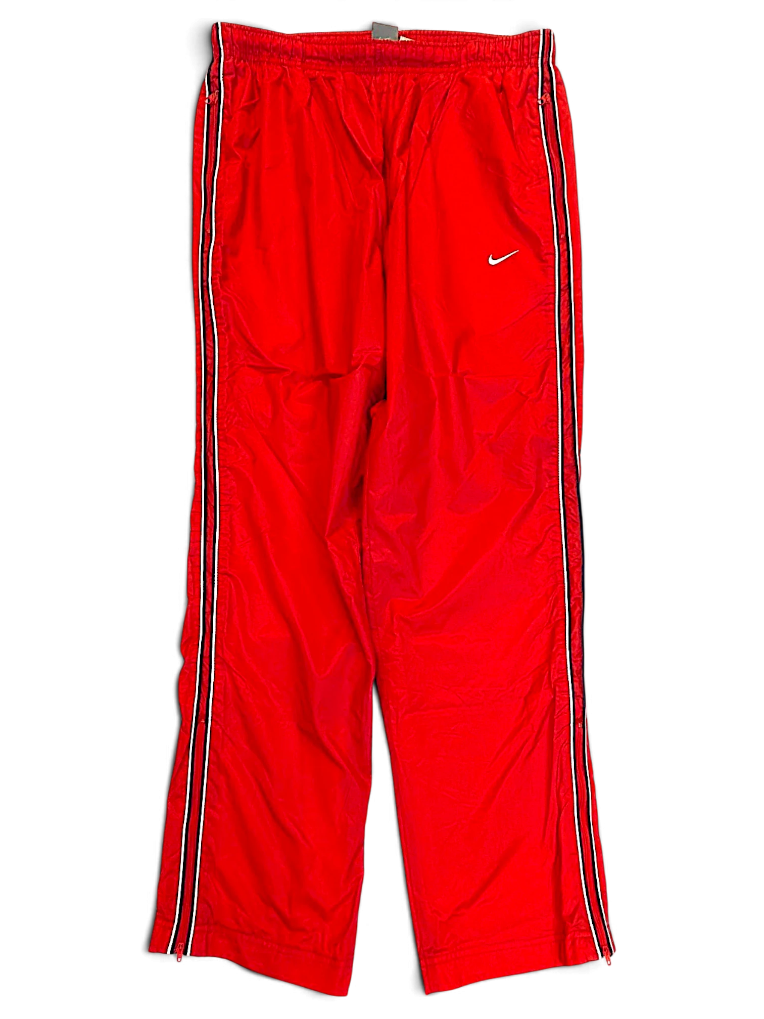 JAKE & IPI pre-owned red Nike track pants with black and white side stripes and white Swoosh logo