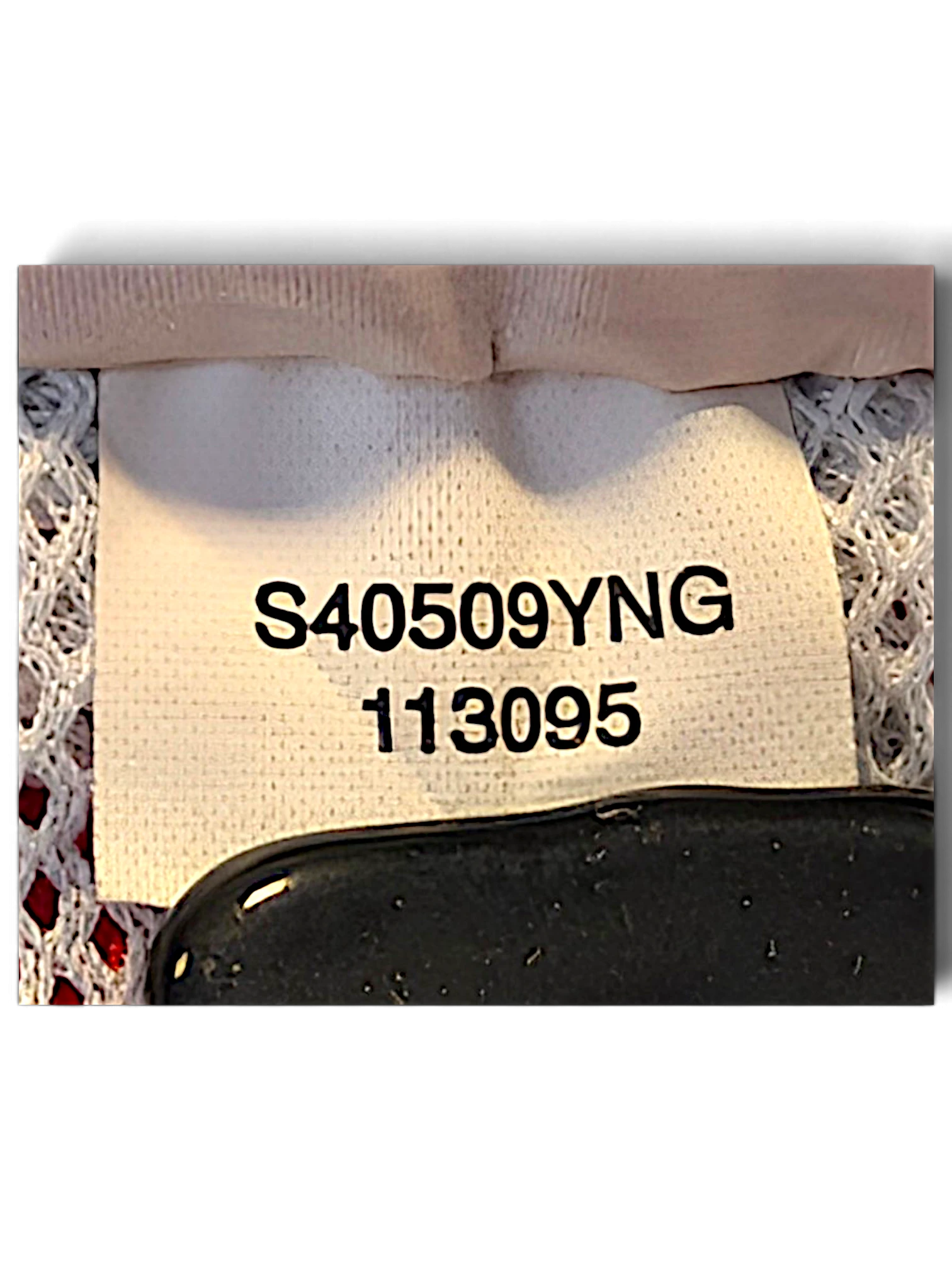 JAKE & IPI Nike track pants internal care label with product code S40509YNG 113095