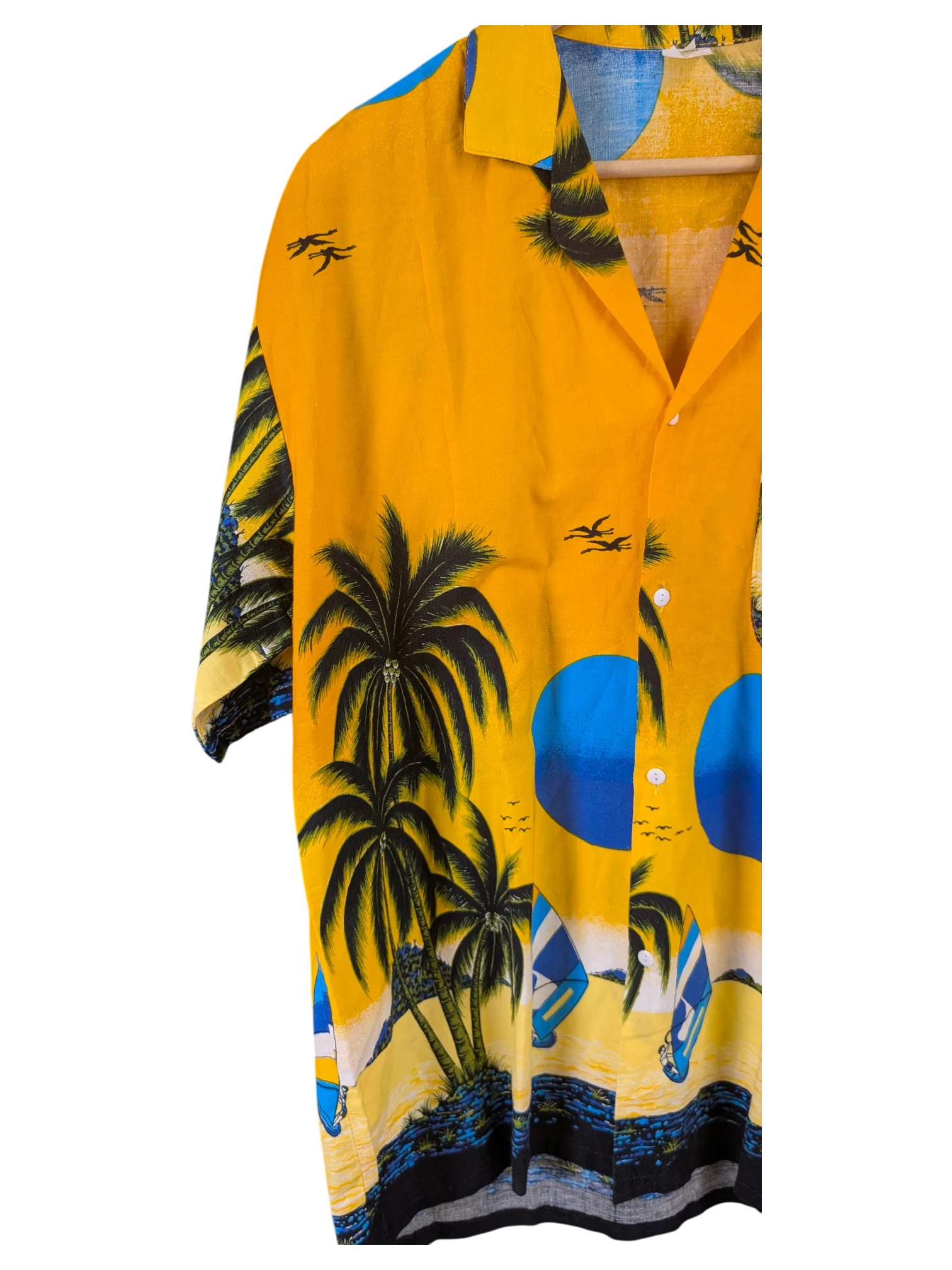 JAKE & IPI orange Hawaiian shirt featuring a tropical beach print with palm trees, sailboats, and a blue sun design.