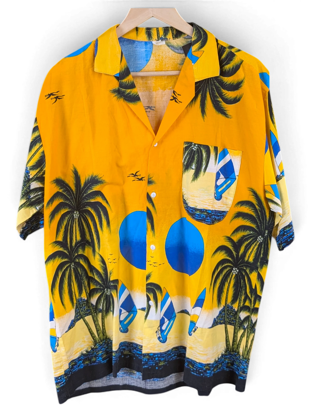JAKE & IPI orange Hawaiian shirt featuring a tropical beach print with palm trees and windsurfers on a button-down.