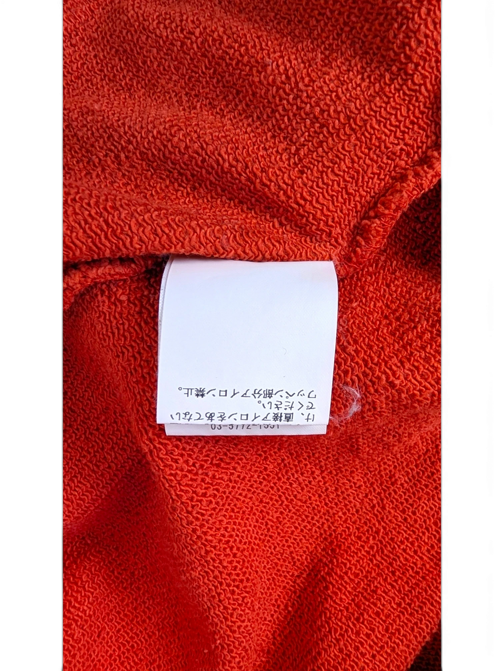 JAKE & IPI Icecream zip hoodie interior fabric texture with Japanese care label in bright orange cotton