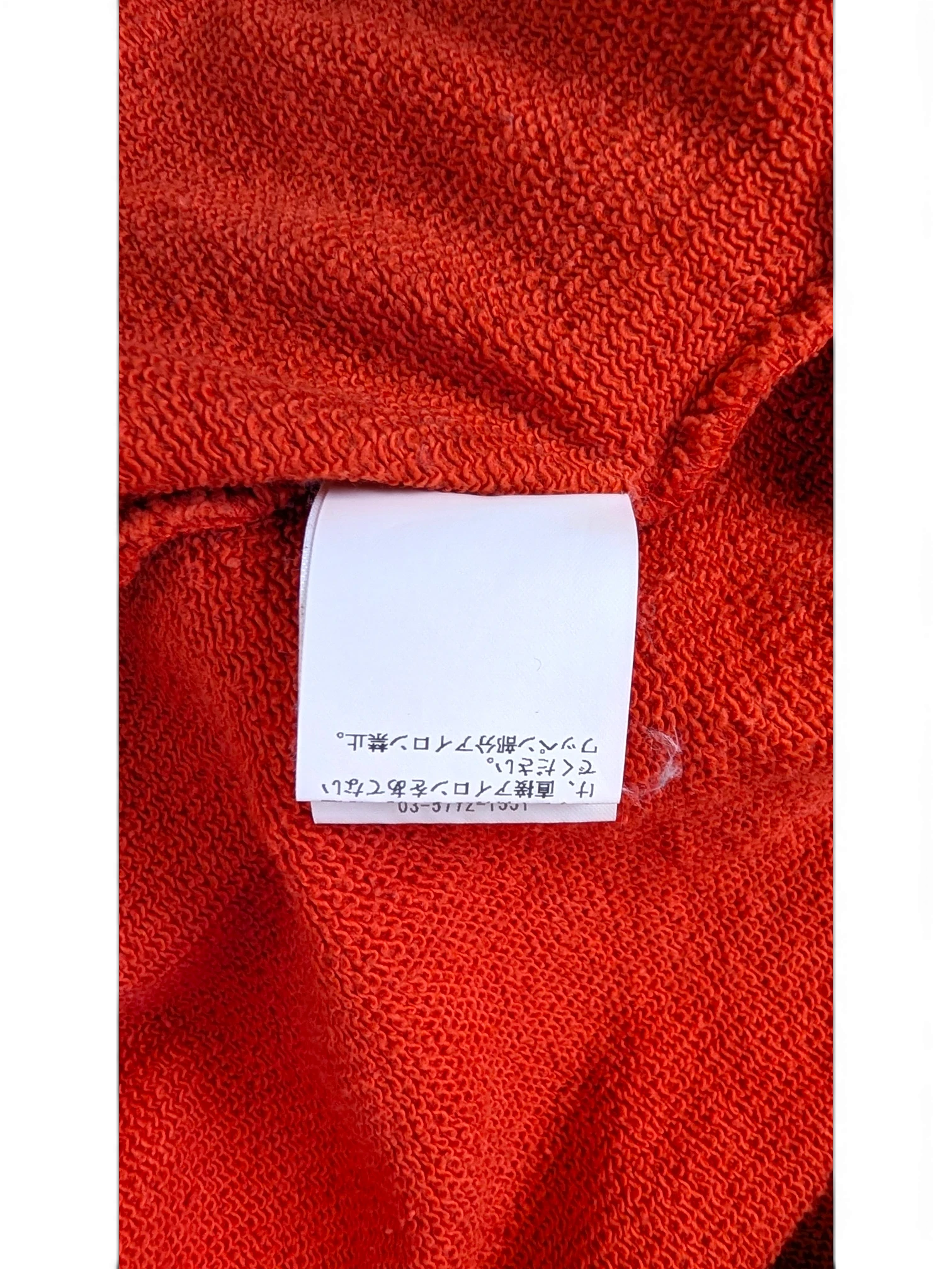 JAKE & IPI Icecream zip hoodie interior fabric texture with Japanese care label in bright orange cotton
