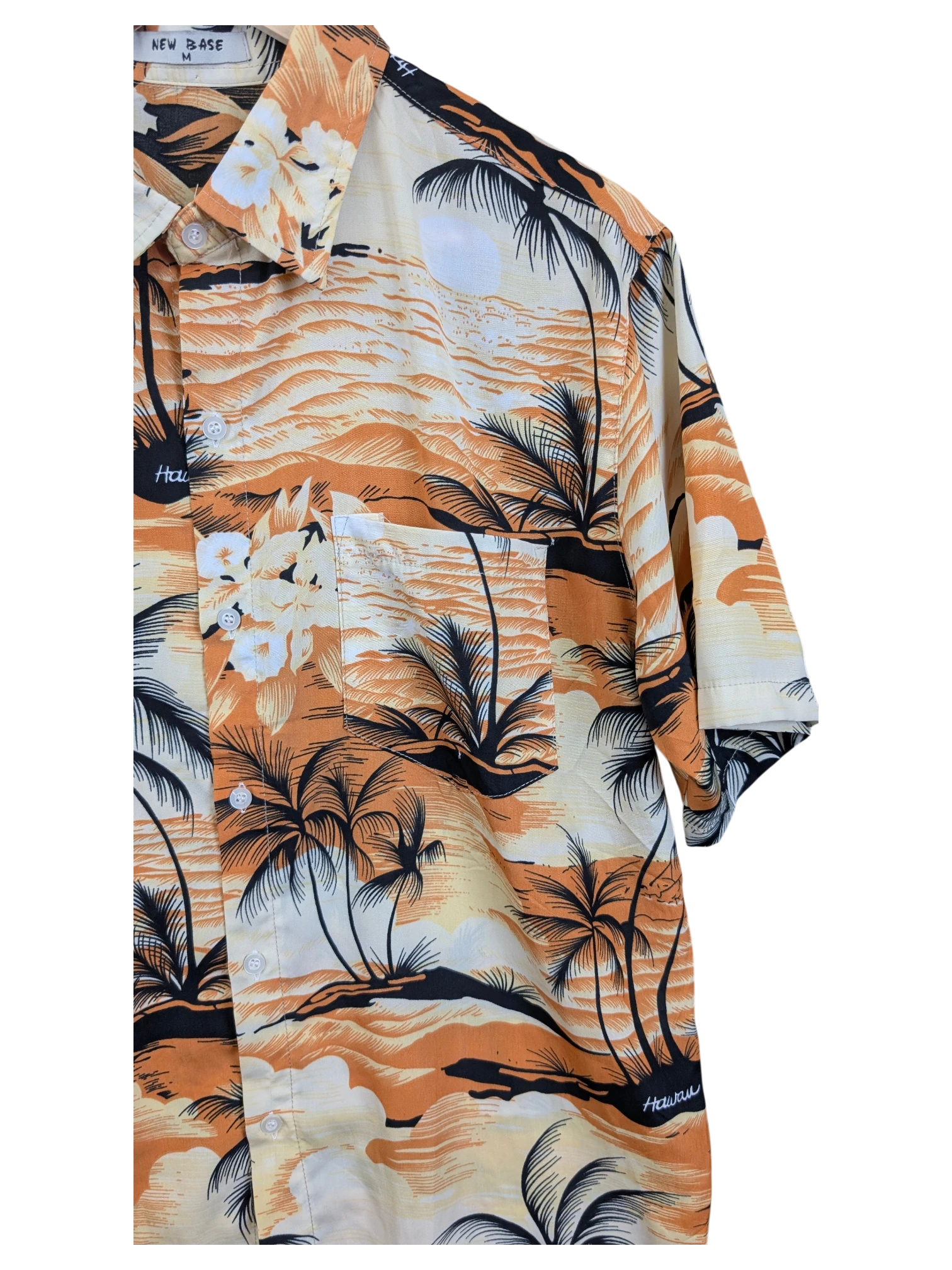 JAKE & IPI New Base Hawaiian shirt featuring a tropical orange and black palm tree sunset print with a chest pocket.