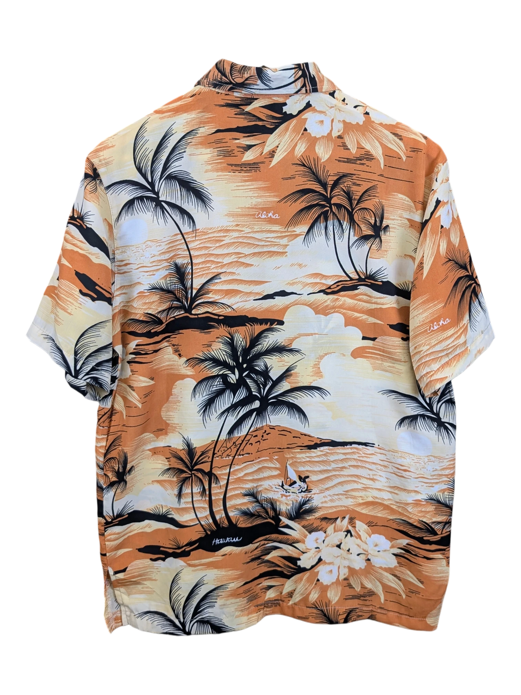 JAKE & IPI Hawaiian shirt featuring a tropical sunset landscape with palm trees and flowers in orange and cream tones.