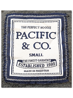 JAKE & IPI Pacific & CO College hoodie interior neck label in white and navy on a grey fleece fabric background