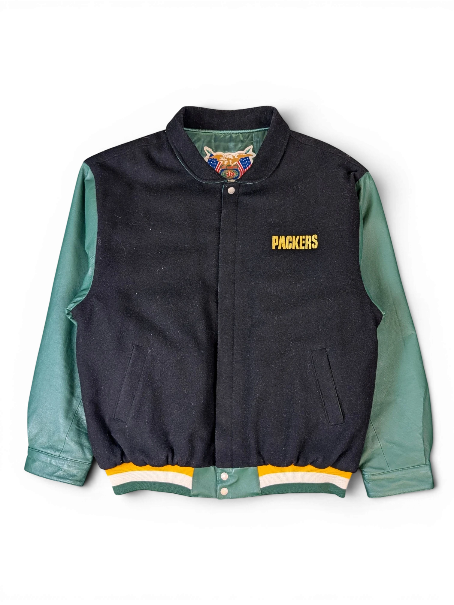 JAKE & IPI Jeff Hamilton Green Bay Packers varsity jacket with black wool body, green leather sleeves, and snap buttons.