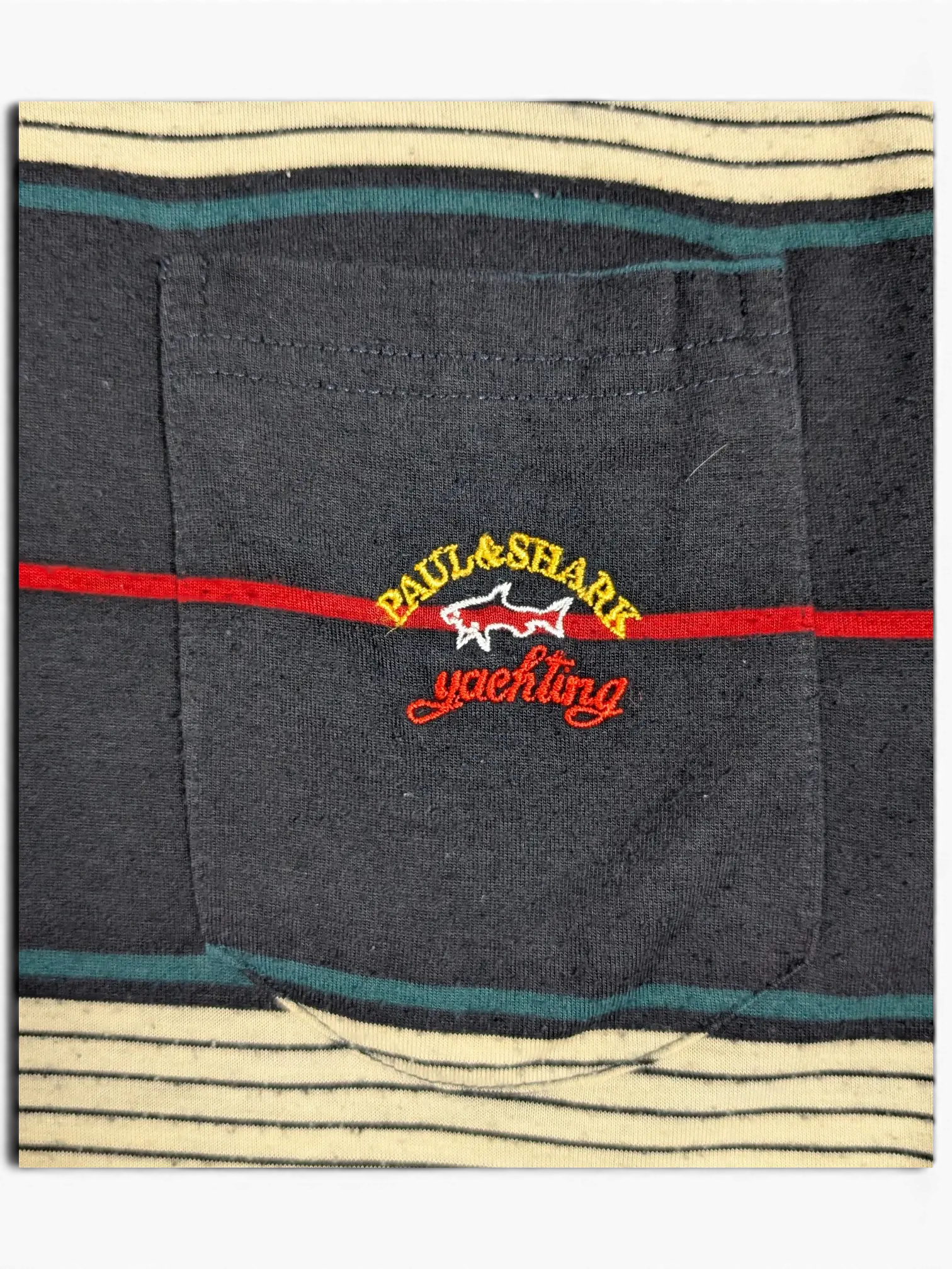 JAKE & IPI pre-owned Paul & Shark Yachting striped polo shirt in navy, cream, green, and red with a chest pocket.