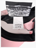 JAKE & IPI IBE NY Moma pink cap interior showing brand and care labels