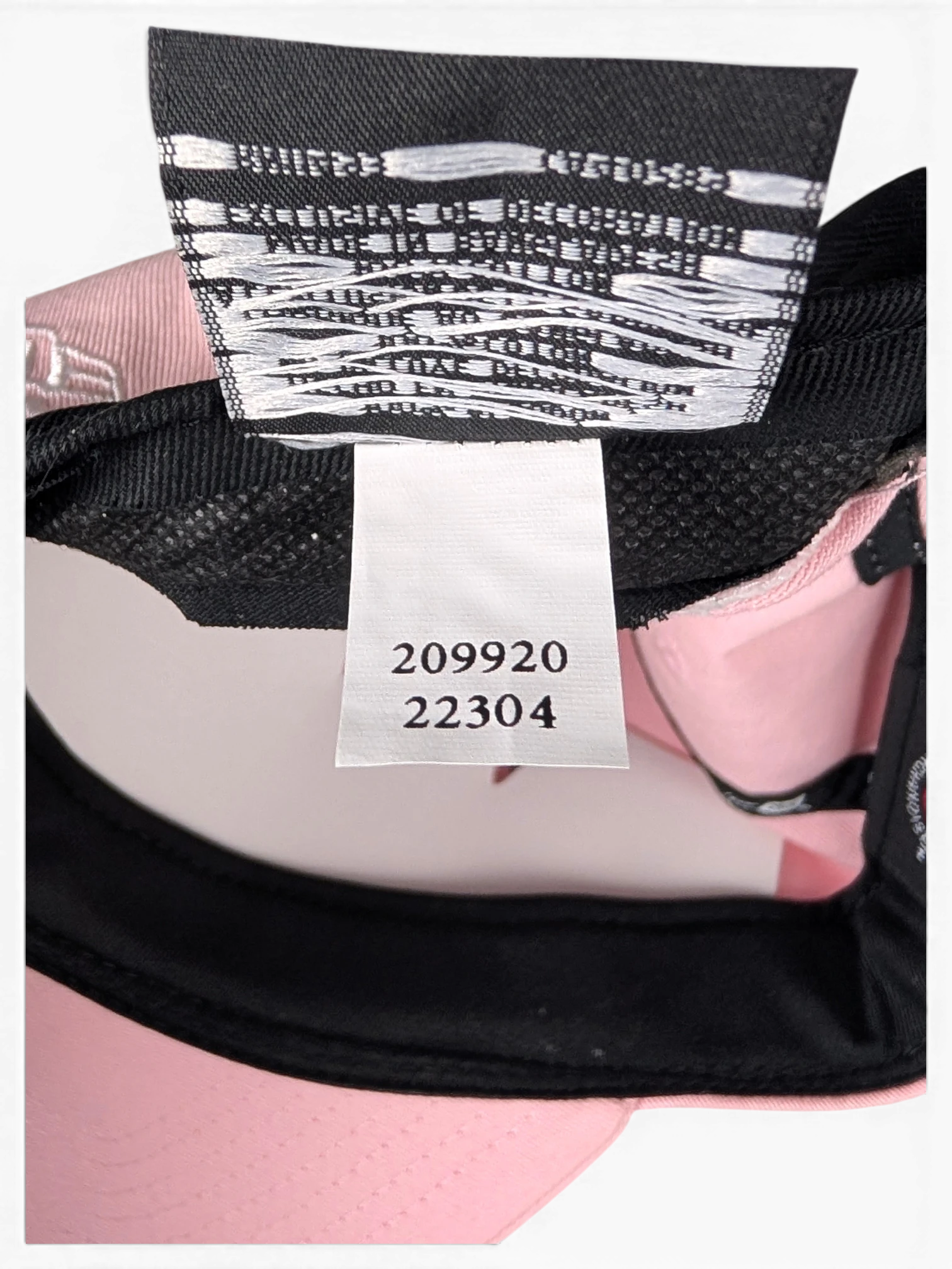 JAKE & IPI IBE NY Moma pink cap interior showing brand and care labels