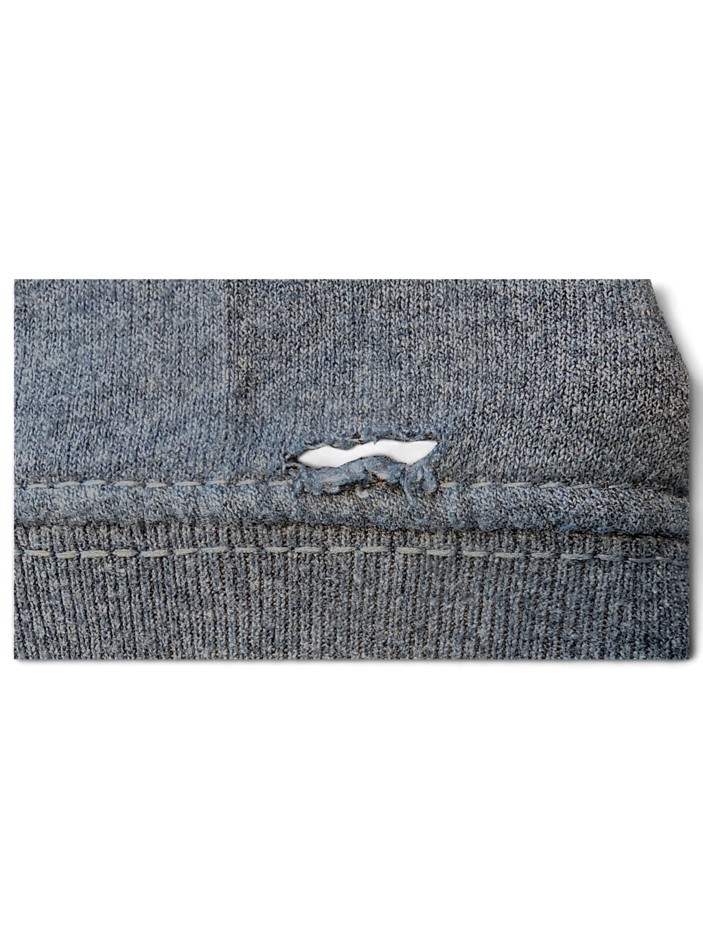 Close-up of a JAKE & IPI Pismo Beach Hoodie showing a small tear in the grey heathered fabric near the seam.