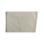 Close-up of JAKE & IPI Portobello’s beige pleated trousers fabric showing texture and visible discoloration marks