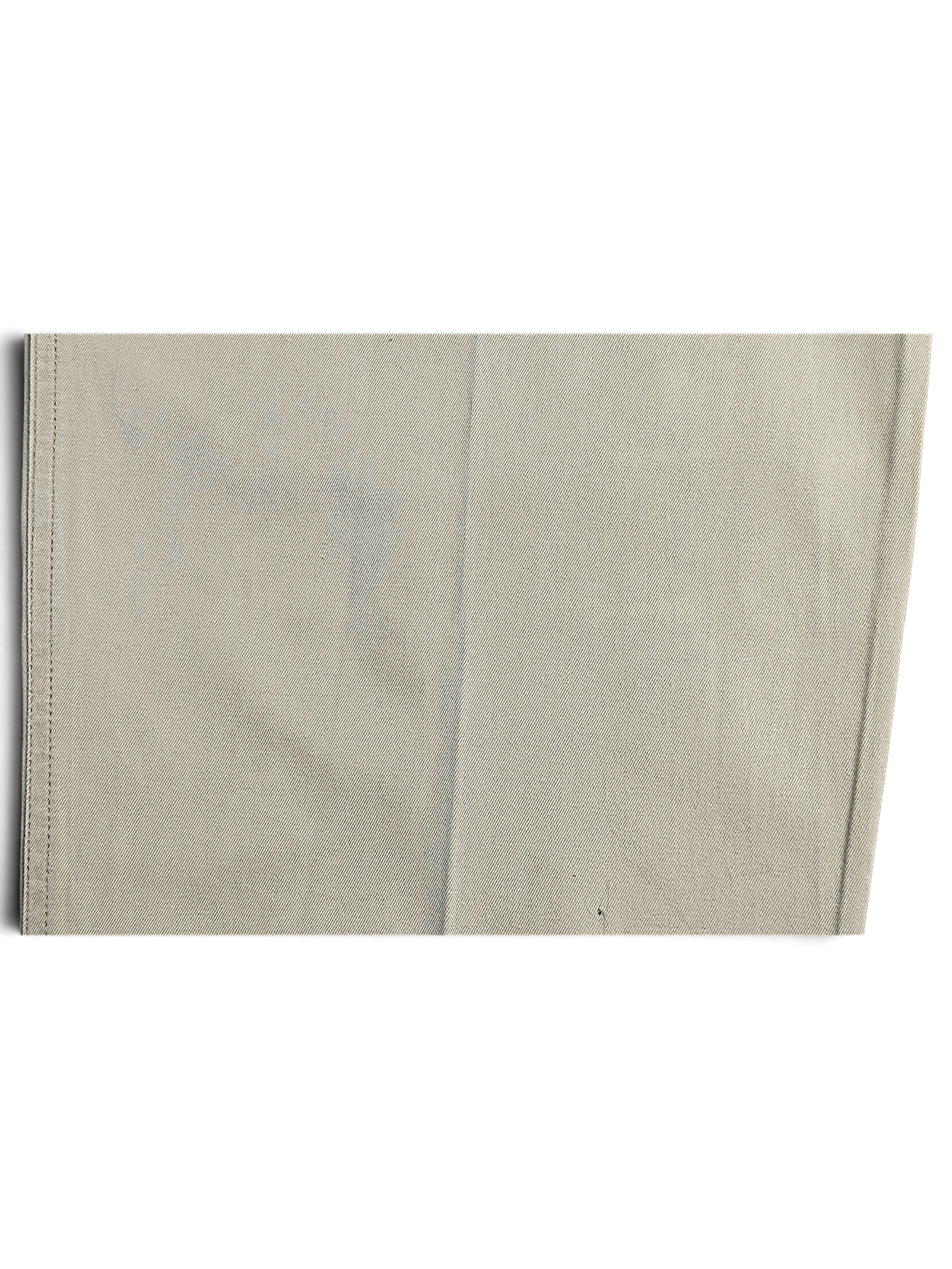 Close-up of JAKE & IPI Portobello’s beige pleated trousers fabric showing texture and visible discoloration marks