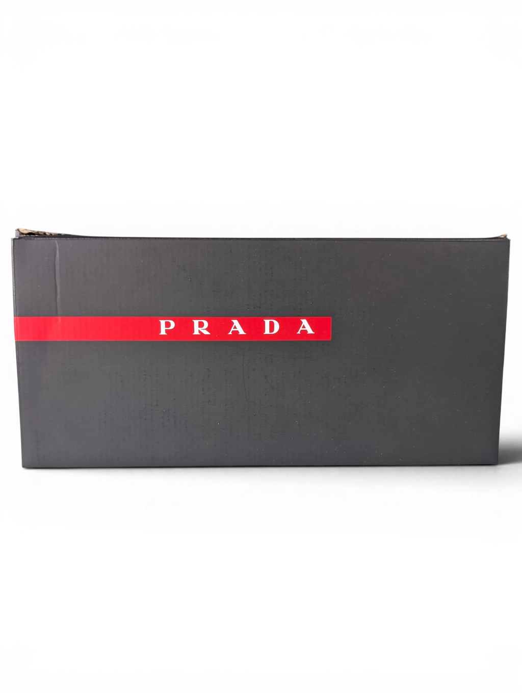 JAKE & IPI black Prada box for Reusch gloves with iconic red stripe logo