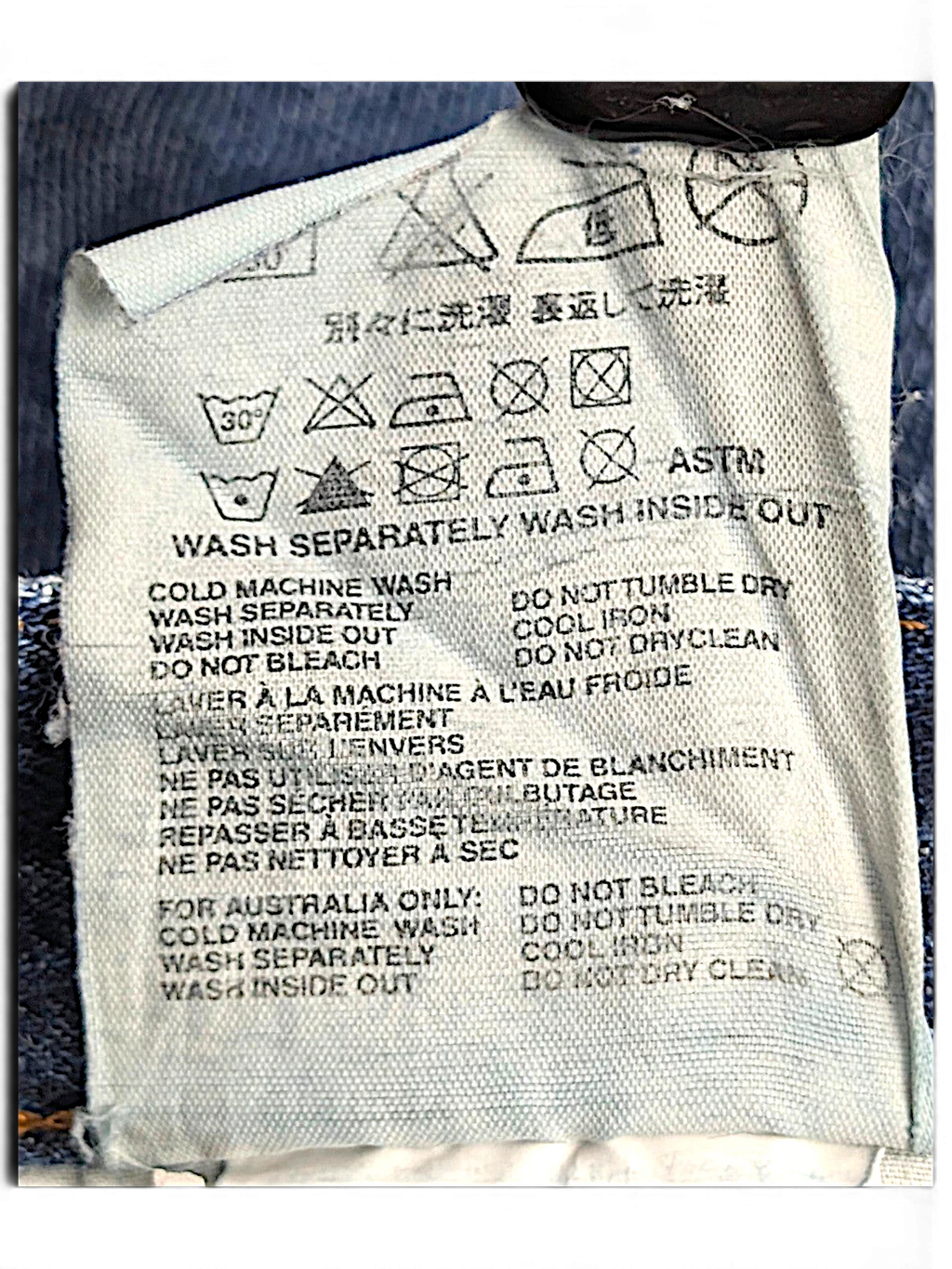 JAKE & IPI Prada blue jeans care and composition label with washing instructions in multiple languages