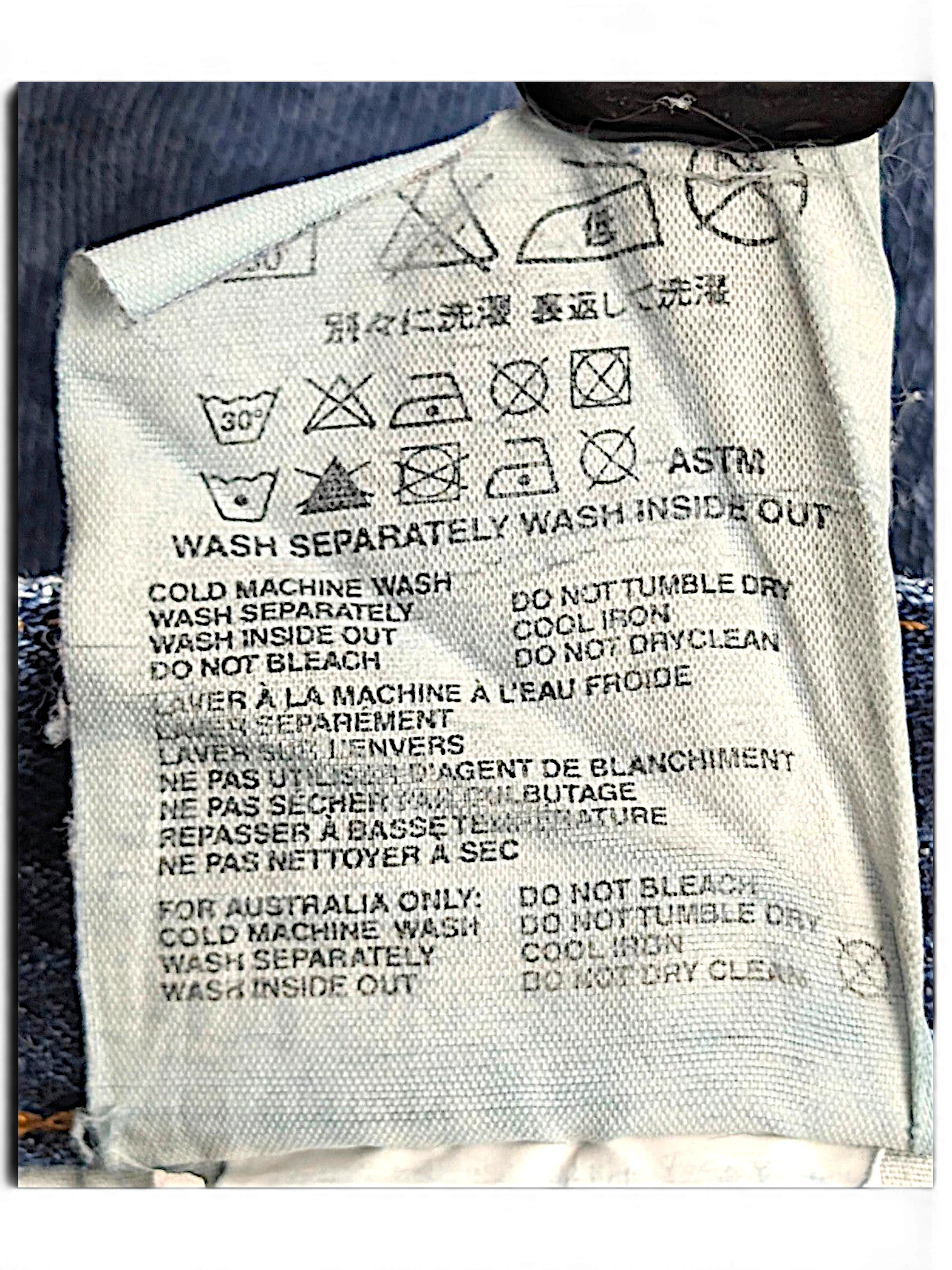 JAKE & IPI Prada blue jeans care and composition label with washing instructions in multiple languages