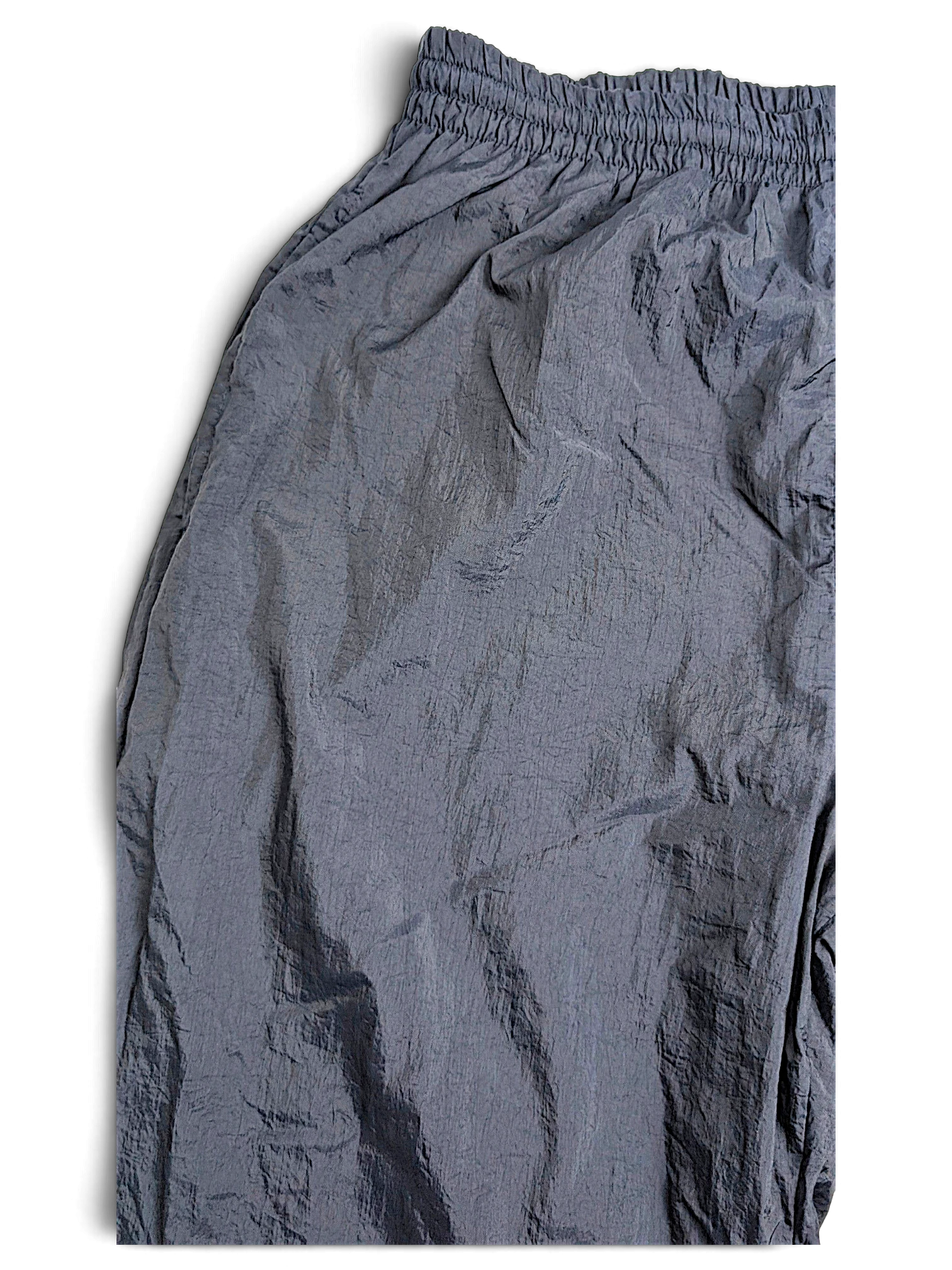 JAKE & IPI pre-owned black Puma lined track pants with elastic waistband and lightweight mixed-fabric texture