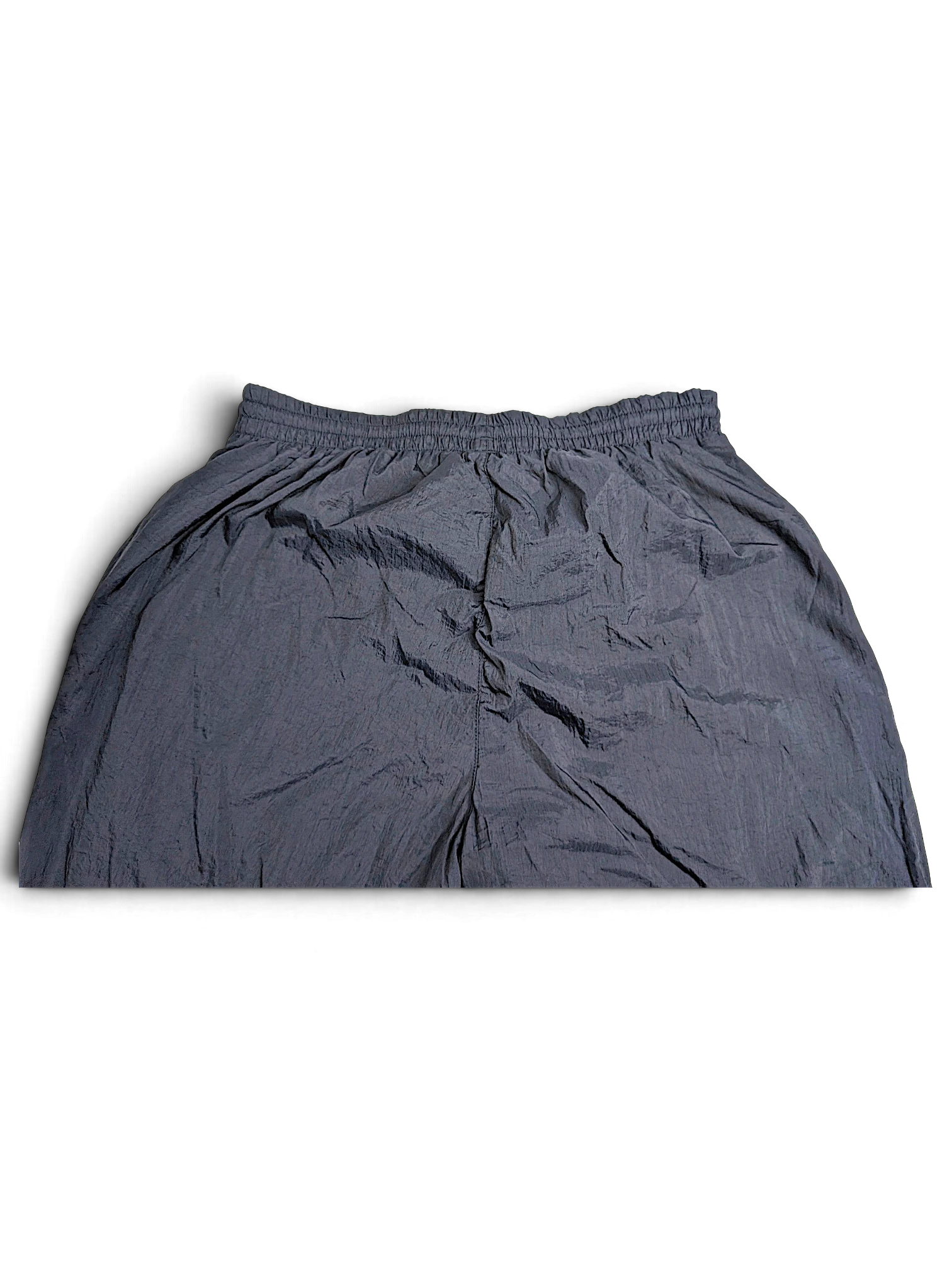 JAKE & IPI pre-owned black Puma lined track pants with an elastic waistband and lightweight mixed-fabric construction.