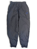 JAKE & IPI pre-owned black Puma track pants with a light blue logo, elastic waist, and lightweight fabric construction.