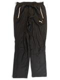 JAKE & IPI pre-owned Puma black track pants with white piping and embroidered logo detail