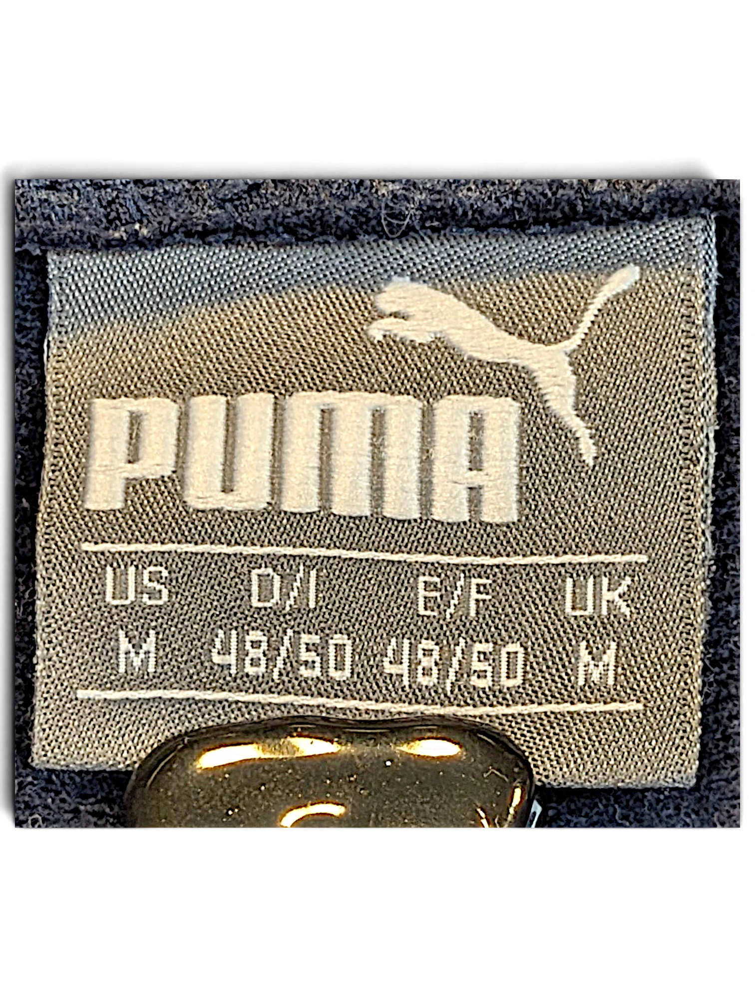 JAKE & IPI pre-owned Puma navy track pants size M clothing label detail