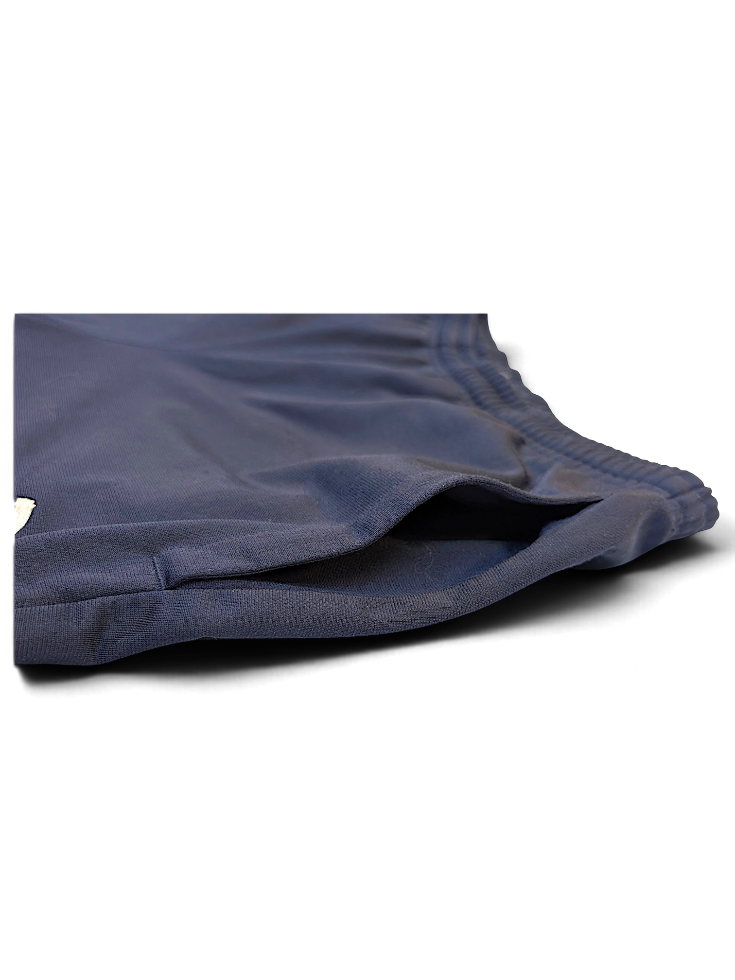 JAKE & IPI pre-owned navy Puma track pants featuring a side pocket and classic straight-leg design.