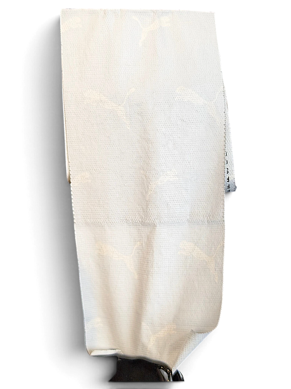 JAKE & IPI Puma black track pants featuring white piping and embroidered branding on a white fabric label detail
