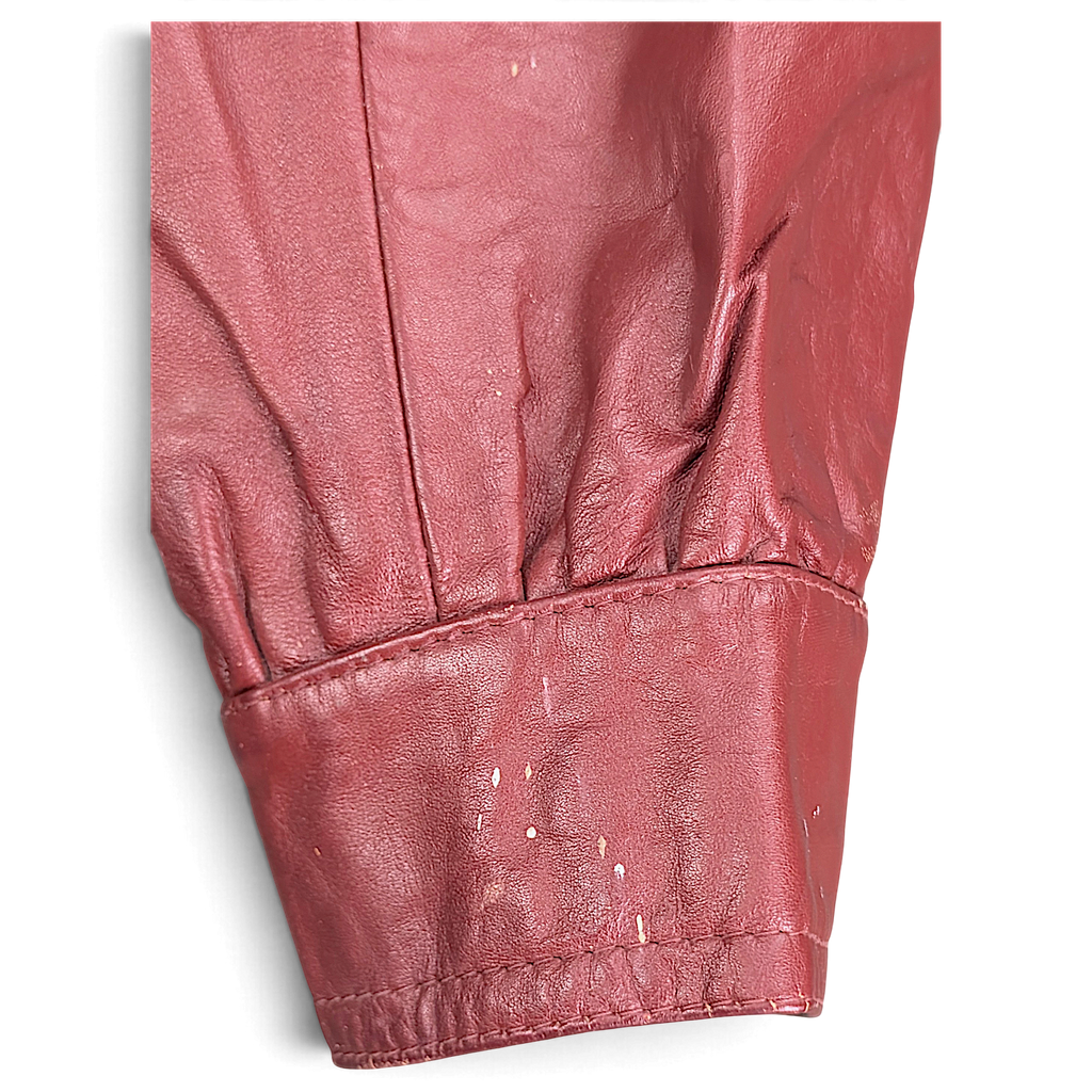 Vintage Red Genuine Leather Jacket Made in Uruguay – 14 – cuff paint-like marks.