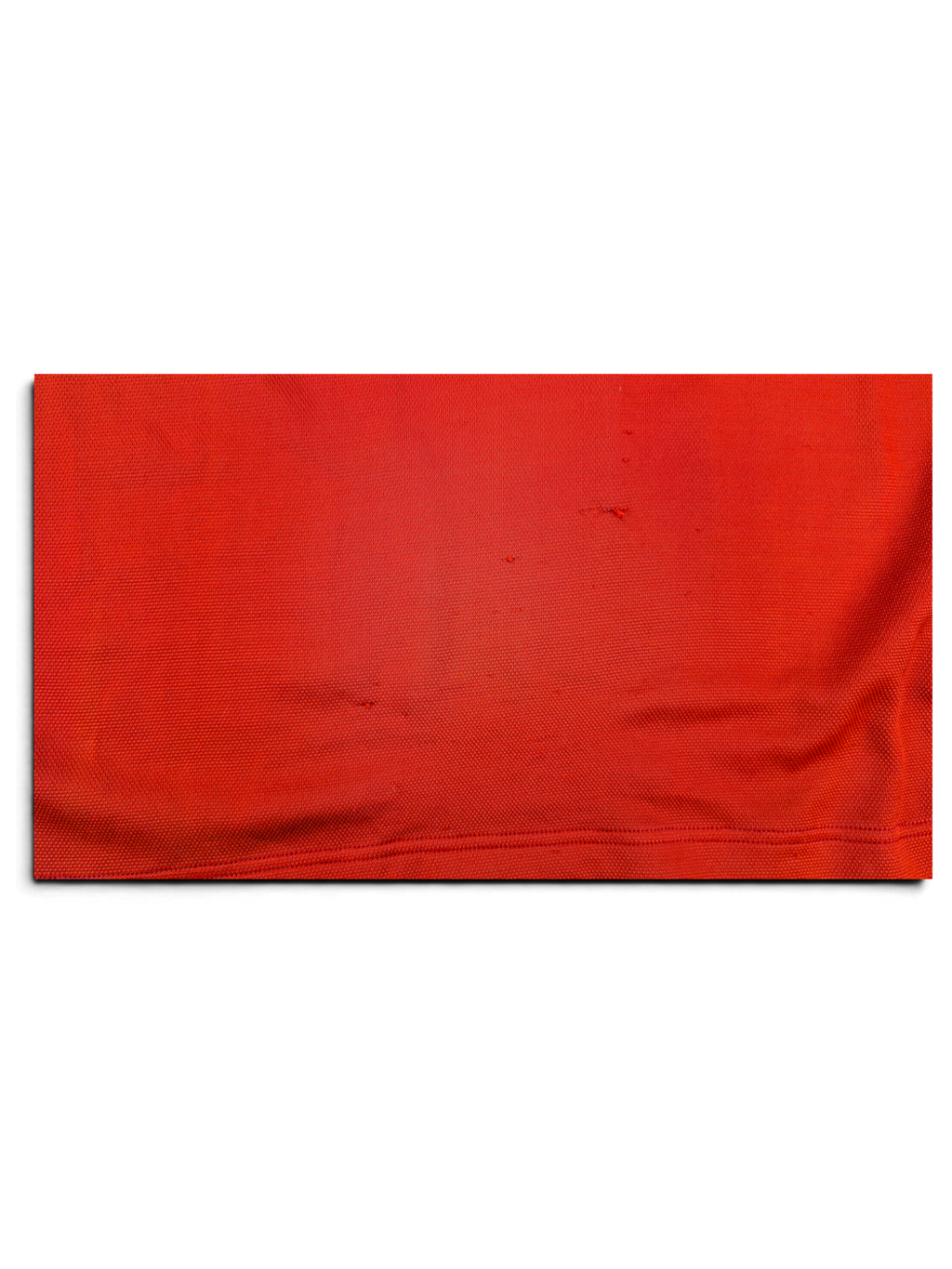 Comme des Garçons Homme polo shirt fabric showing small holes, pulls and wear