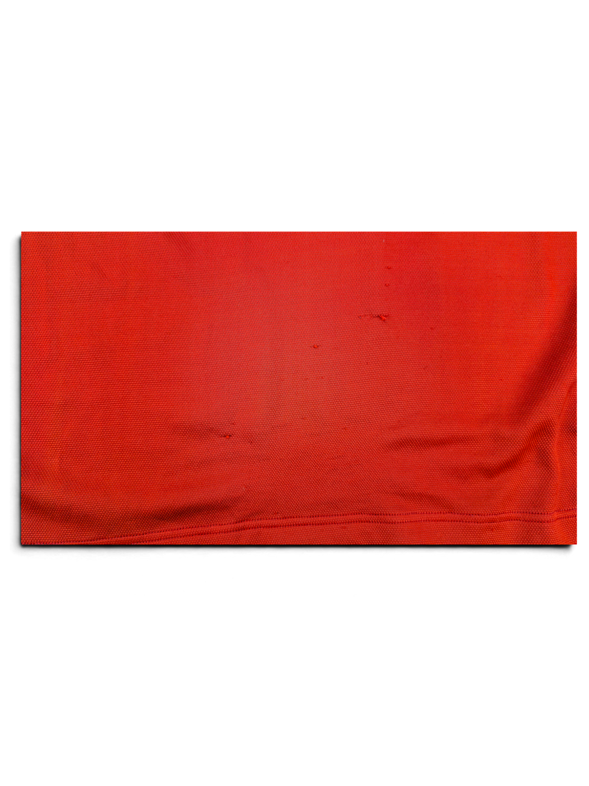 Comme des Garçons Homme polo shirt fabric showing small holes, pulls and wear