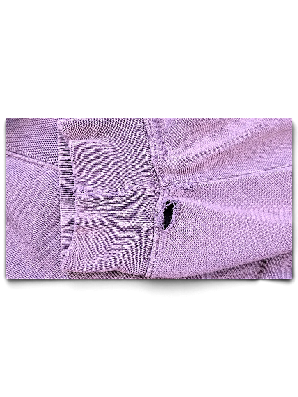 JAKE & IPI purple college sweatshirt sleeve detail showing ribbed cuff and small distressed hole