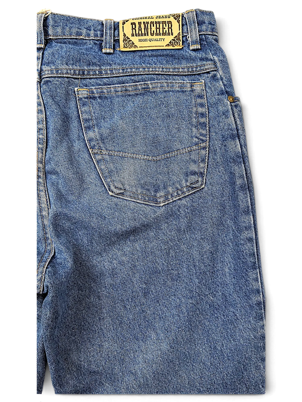 JAKE & IPI Rancher jeans in medium wash blue denim with a leather brand patch on the back waistband