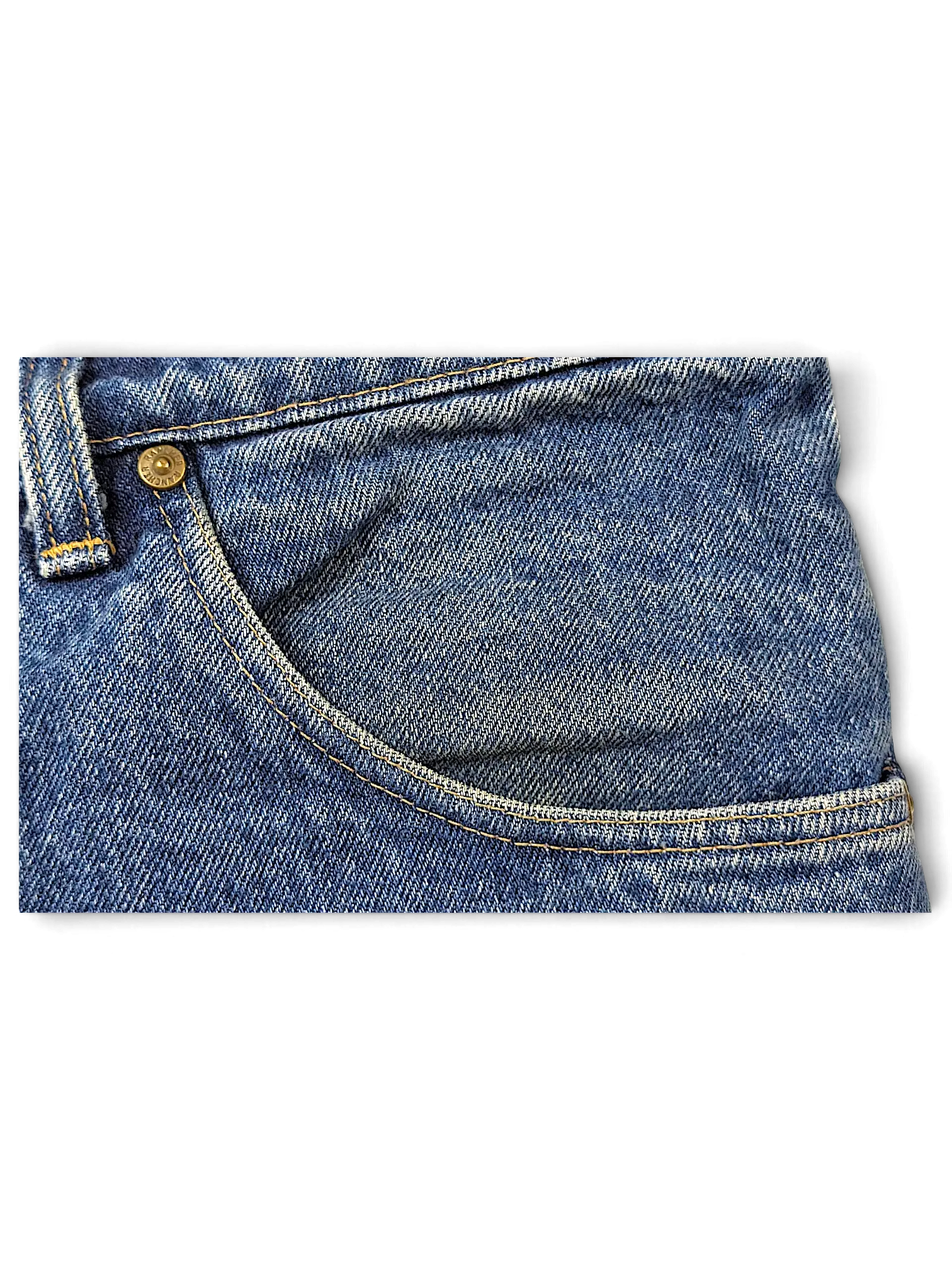 Close-up of JAKE & IPI Rancher Jeans featuring blue denim fabric, a metal rivet, and contrast stitching.