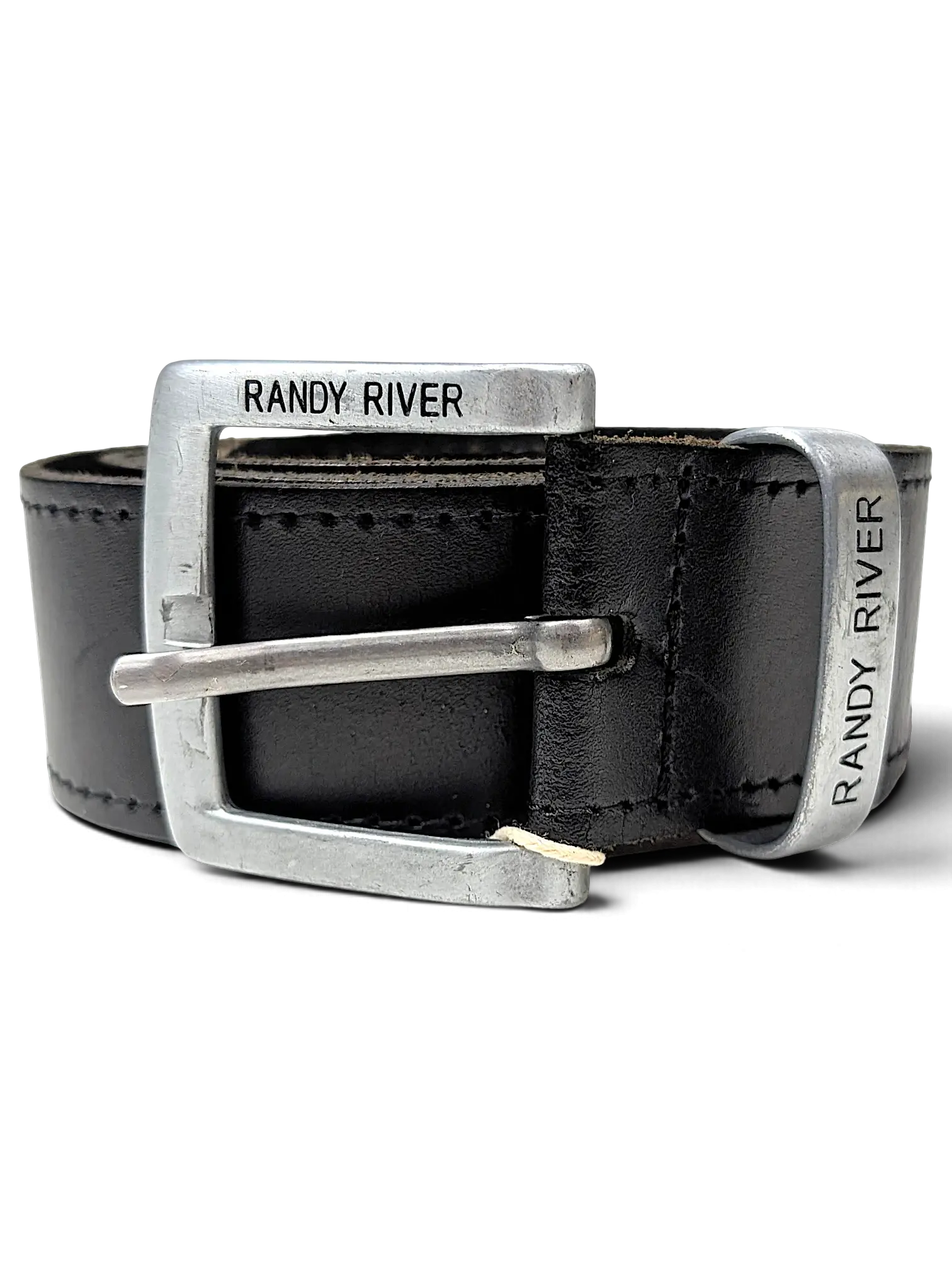JAKE & IPI Randy River black leather belt featuring a brushed silver metal buckle with engraved branding.